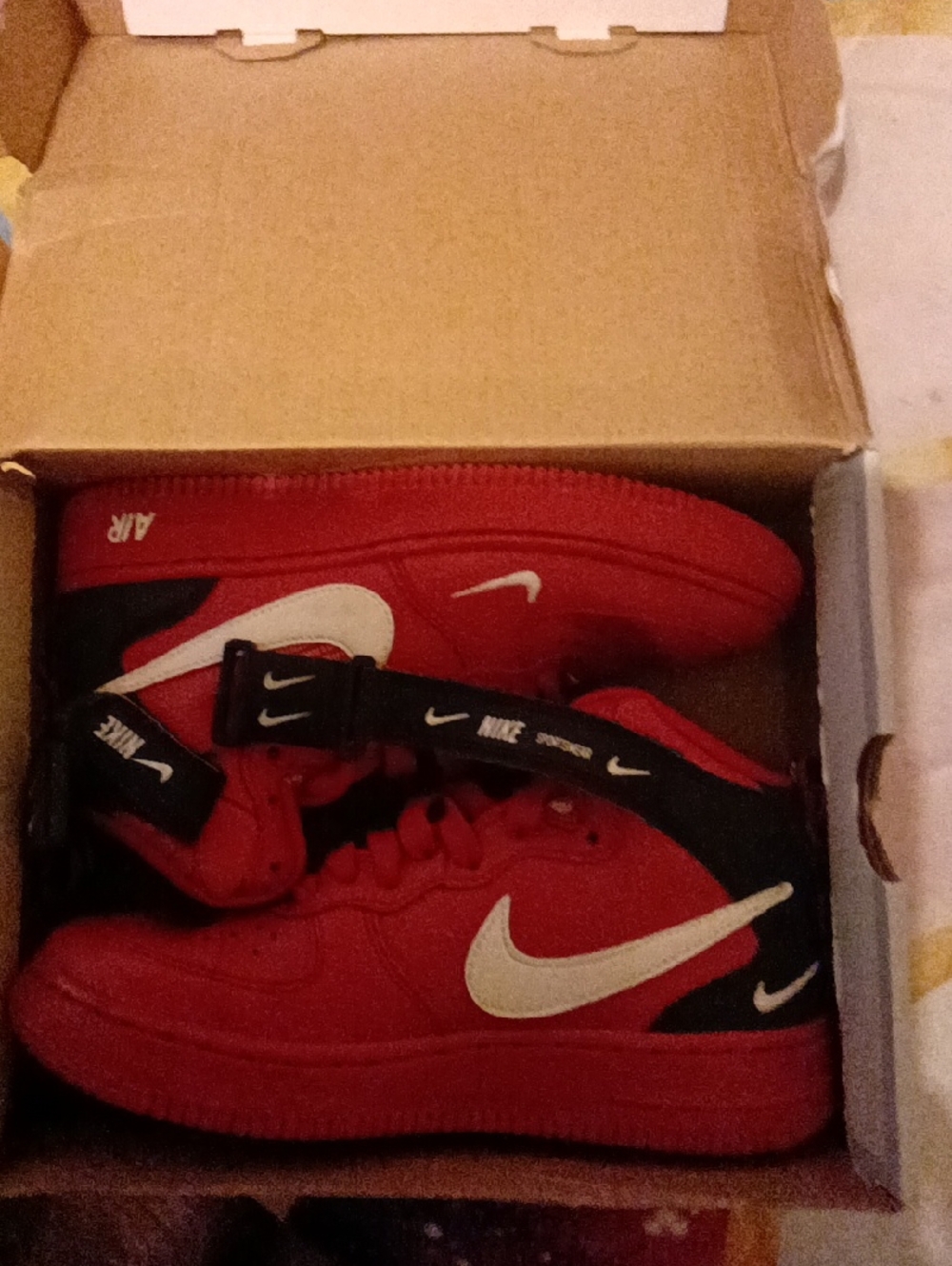 Nike Red and Black High-Top Sneakers with White Swoosh Accent
